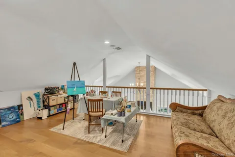 a living room with furniture and a table