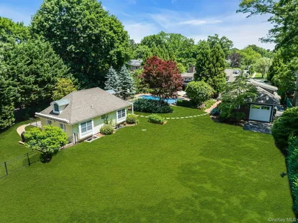 a view of a garden with a patio