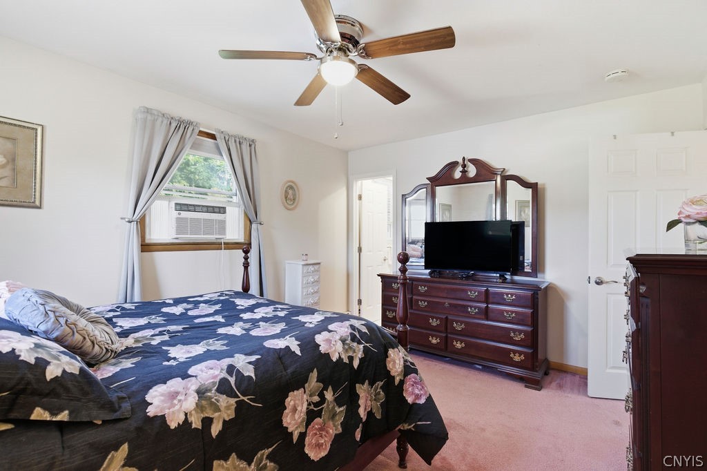 7454 Thunderbird Road Clay, NY 13088 - Photo 30 of 48 Primary Suite. (Hardwood floors under carpets.)
