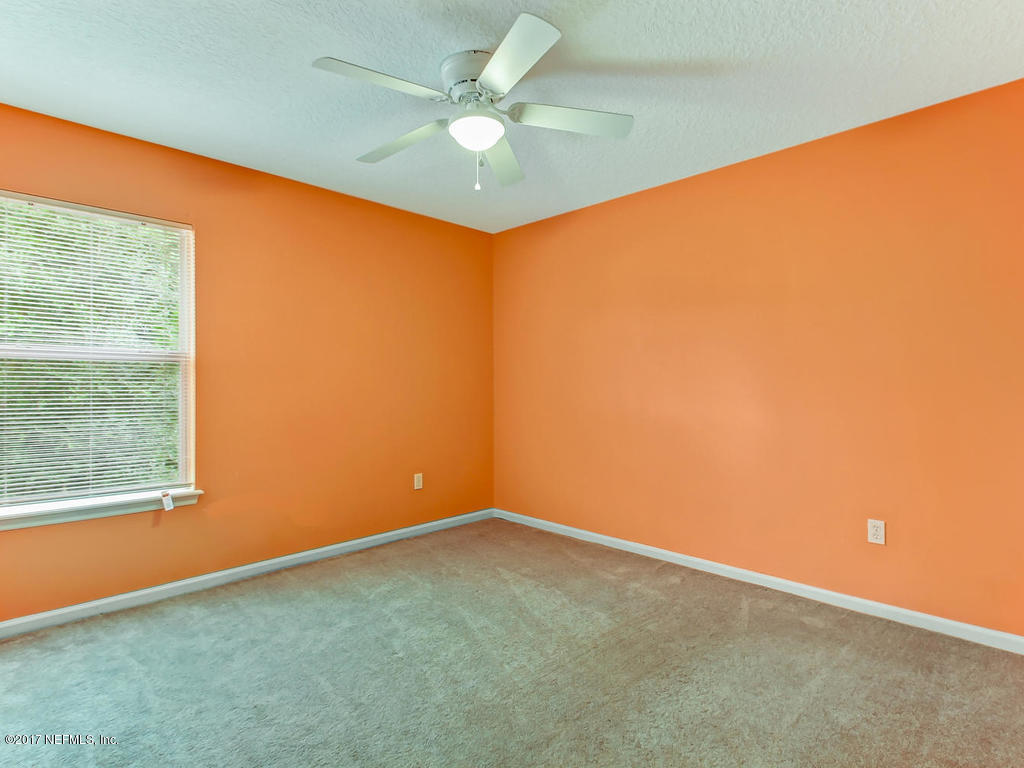 9158 Raptor Drive Jacksonville, FL 32221 - Photo 31 of 45 an empty room with a window