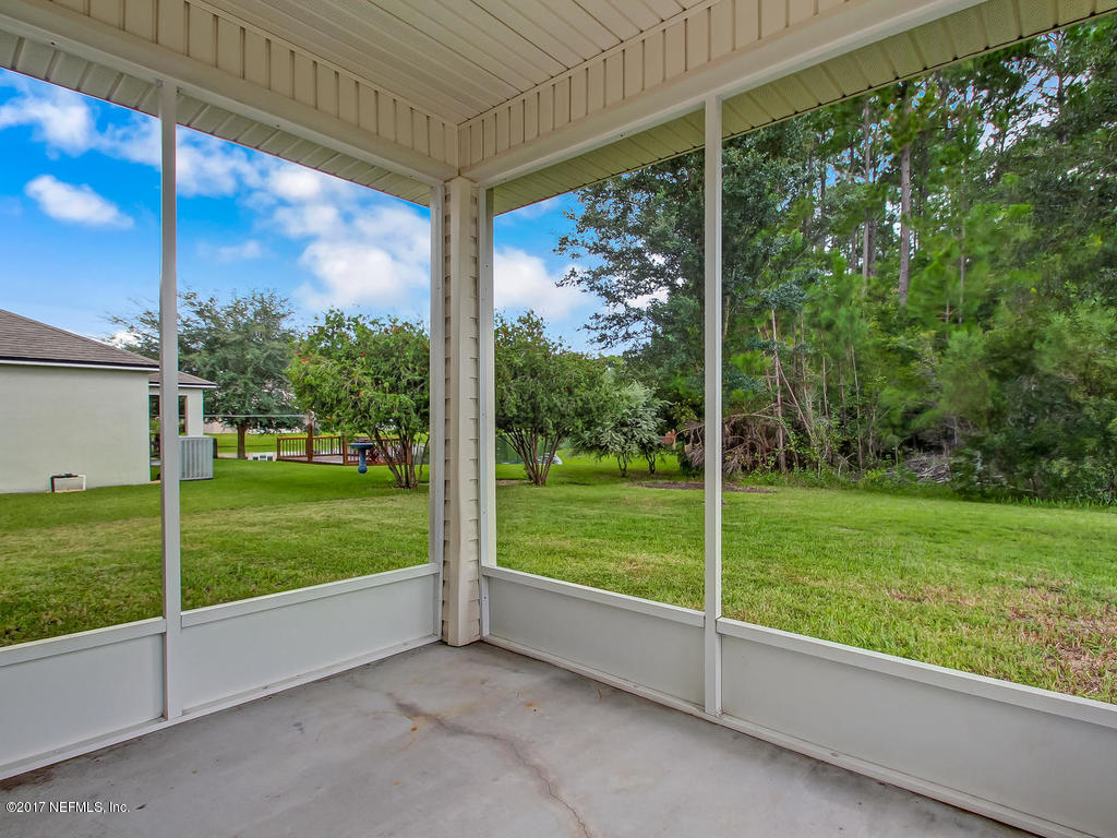9158 Raptor Drive Jacksonville, FL 32221 - Photo 36 of 45 a view of a garden from a window