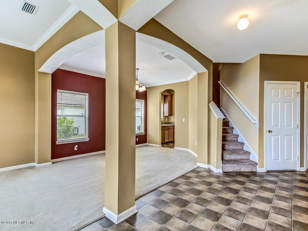 9158 Raptor Drive Jacksonville, FL 32221 - Photo 4 of 45 a view of a hallway view with staircase
