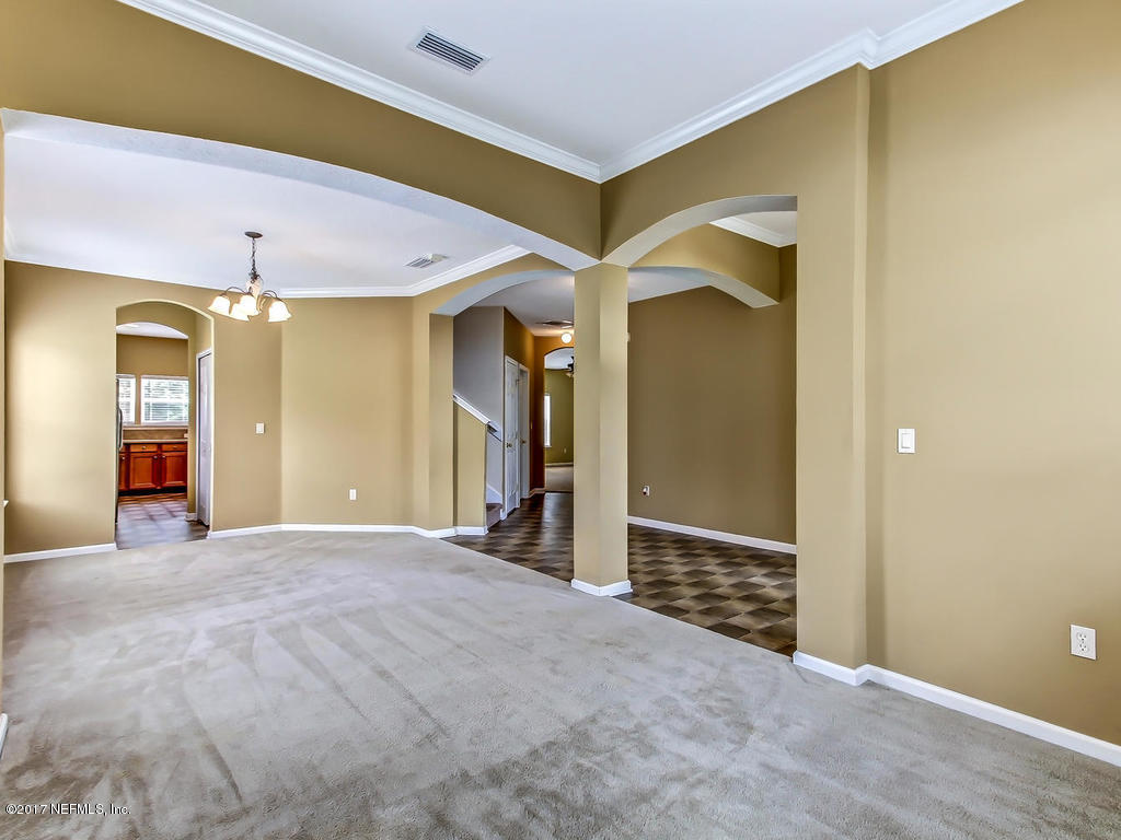 9158 Raptor Drive Jacksonville, FL 32221 - Photo 5 of 45 a view of an empty room with closet and a window