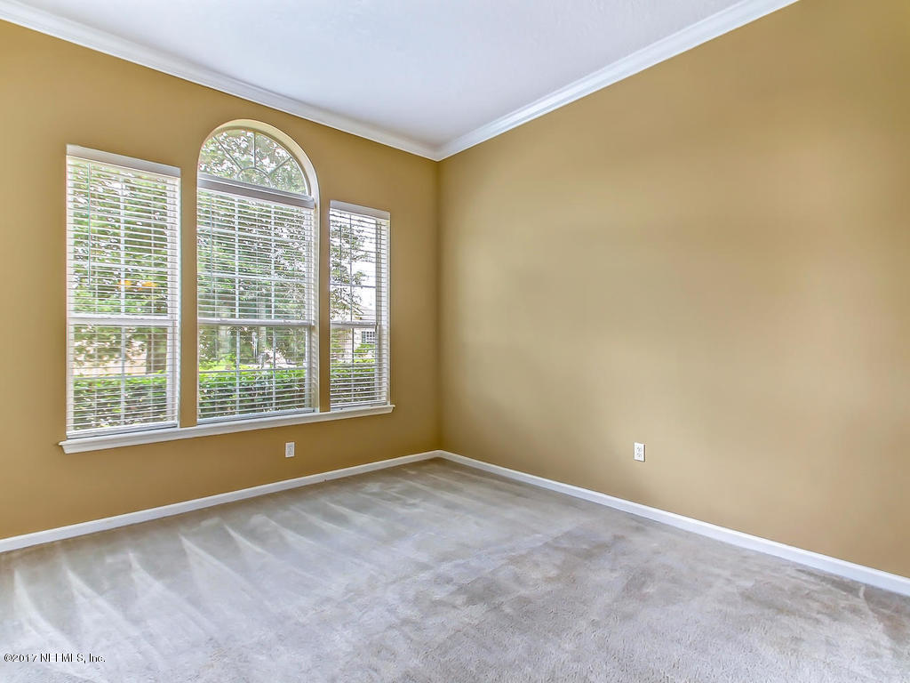 9158 Raptor Drive Jacksonville, FL 32221 - Photo 6 of 45 a view of an empty room with a window