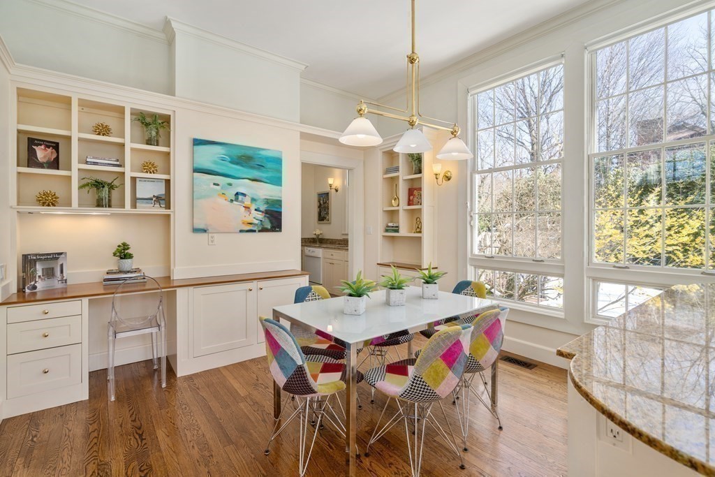 386 Commonwealth Avenue Newton, MA 02467 - Photo 11 of 28 a view of a dining room with furniture window and wooden floor