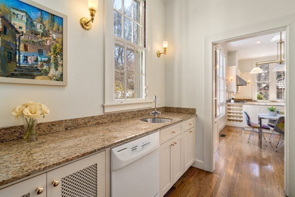 386 Commonwealth Avenue Newton, MA 02467 - Photo 14 of 28 a hallway with sink and view of living room