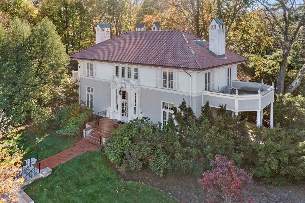 386 Commonwealth Avenue Newton, MA 02467 - Photo 23 of 28 a front view of a house with a yard and trees