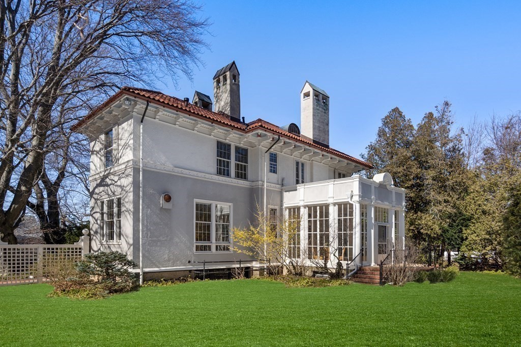 386 Commonwealth Avenue Newton, MA 02467 - Photo 25 of 28 a front view of a house with a garden