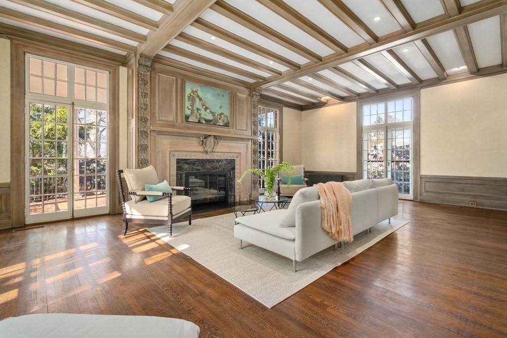 386 Commonwealth Avenue Newton, MA 02467 - Photo 3 of 28 a living room with furniture and a fireplace