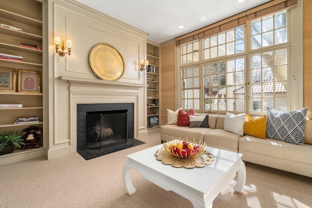 386 Commonwealth Avenue Newton, MA 02467 - Photo 5 of 28 a living room with furniture and a fireplace