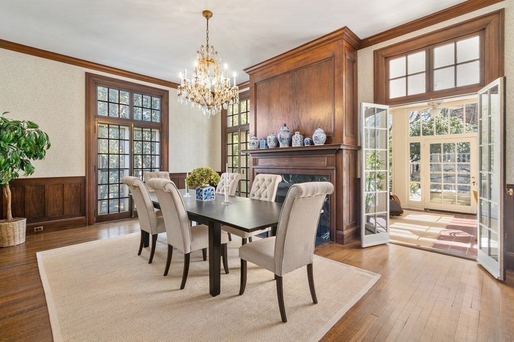 386 Commonwealth Avenue Newton, MA 02467 - Photo 6 of 28 a view of a dining room with furniture wooden floor and chandelier