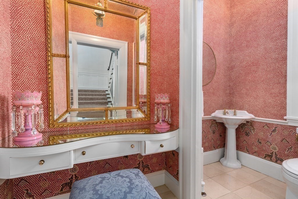 386 Commonwealth Avenue Newton, MA 02467 - Photo 9 of 28 a bathroom with a sink and a mirror