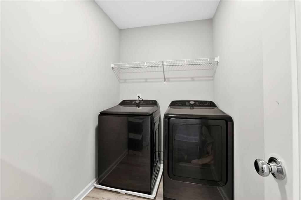 5259 Cloud Street Stone Mountain, GA 30083 - Photo 23 of 38 a utility room with dryer and washer