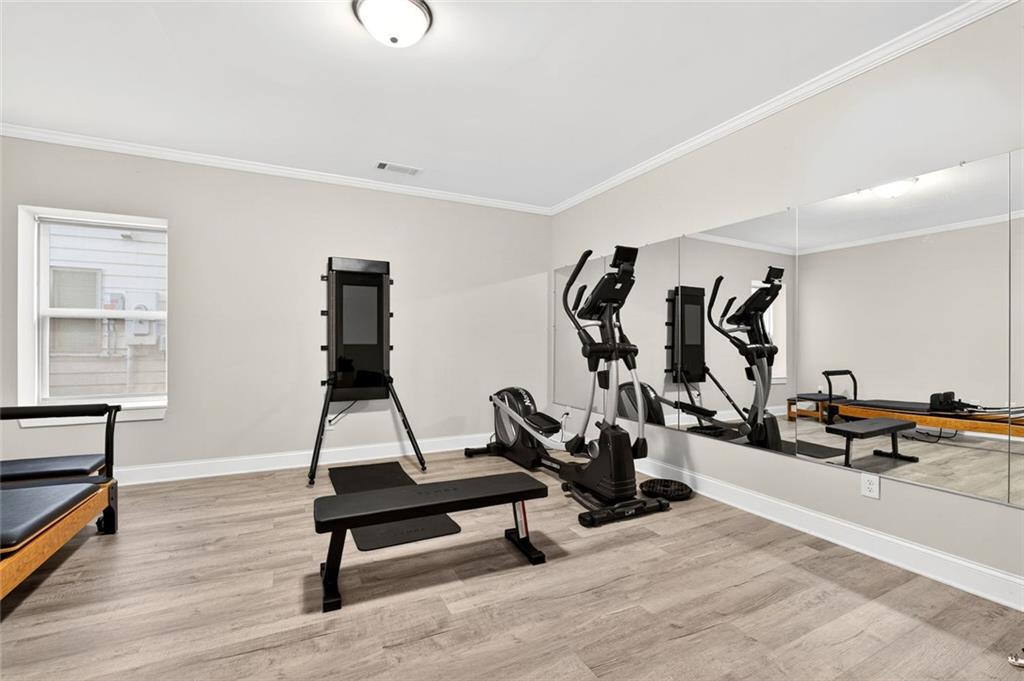 5259 Cloud Street Stone Mountain, GA 30083 - Photo 30 of 38 a view of a room with gym equipment