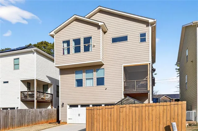 a front view of house along with street