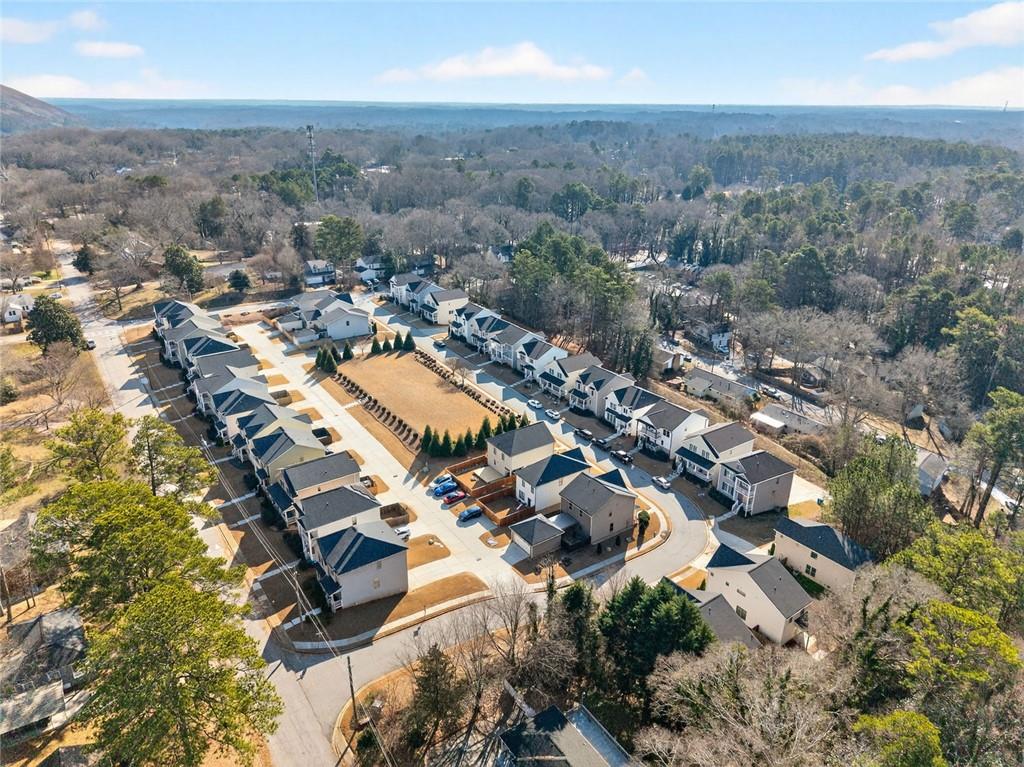 5259 Cloud Street Stone Mountain, GA 30083 - Photo 35 of 38 an aerial view of residential building with parking