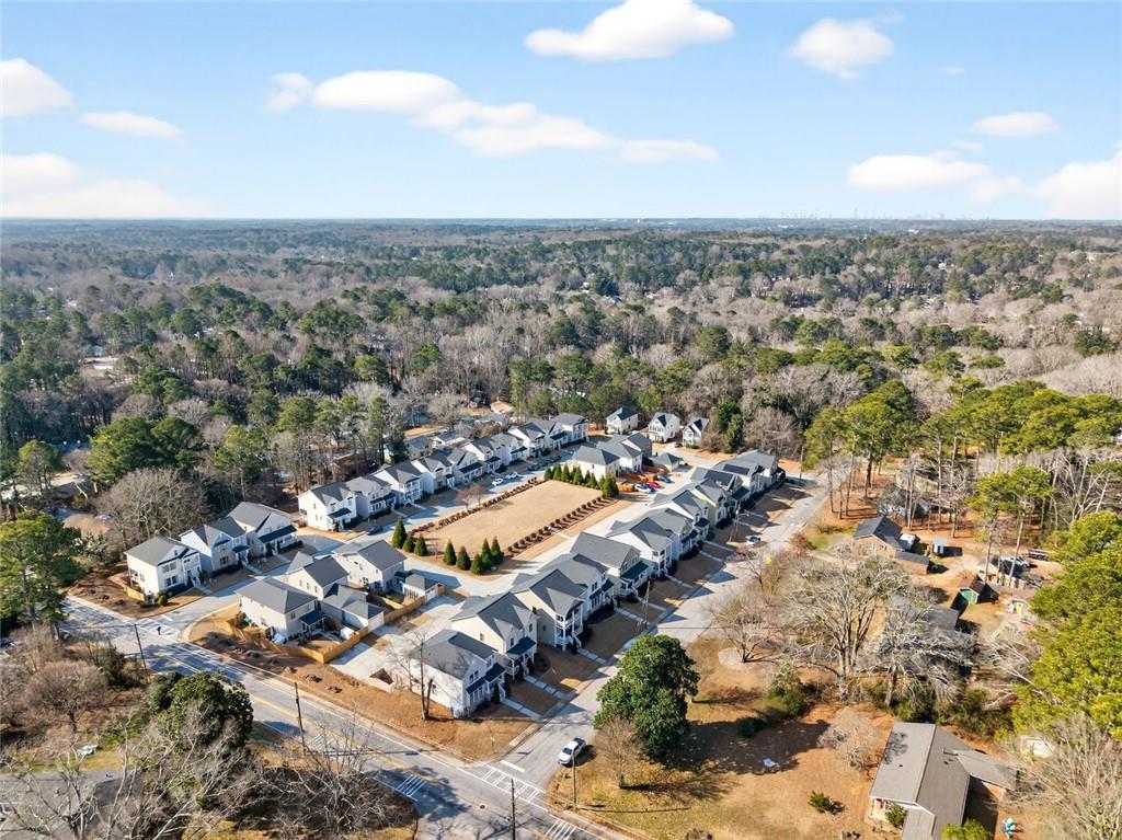 5259 Cloud Street Stone Mountain, GA 30083 - Photo 36 of 38 an aerial view of residential houses with outdoor space