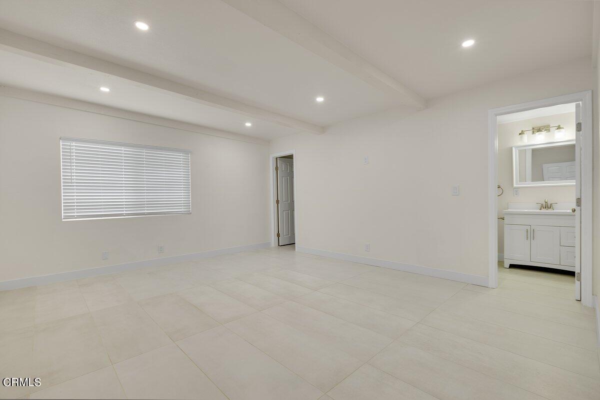 2075 Suner Circle Camarillo, CA 93010 - Photo 6 of 10 an empty room with windows and closet