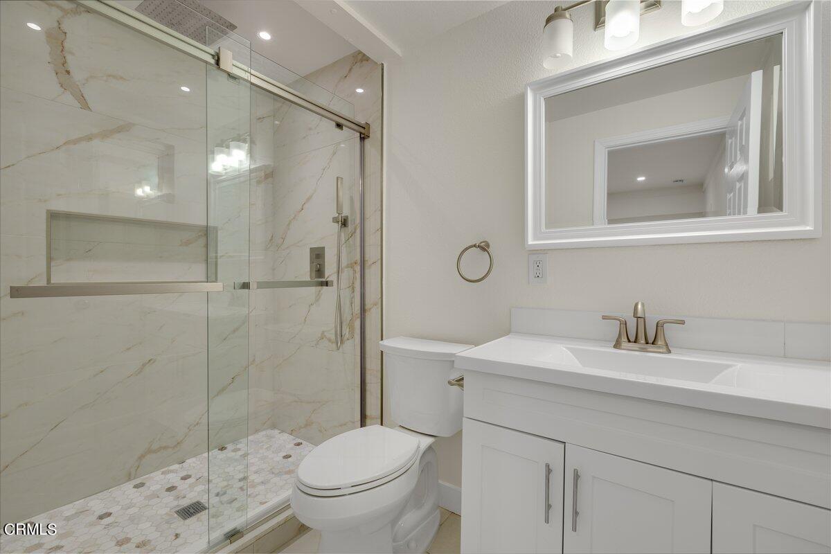 2075 Suner Circle Camarillo, CA 93010 - Photo 8 of 10 a bathroom with a sink toilet and shower