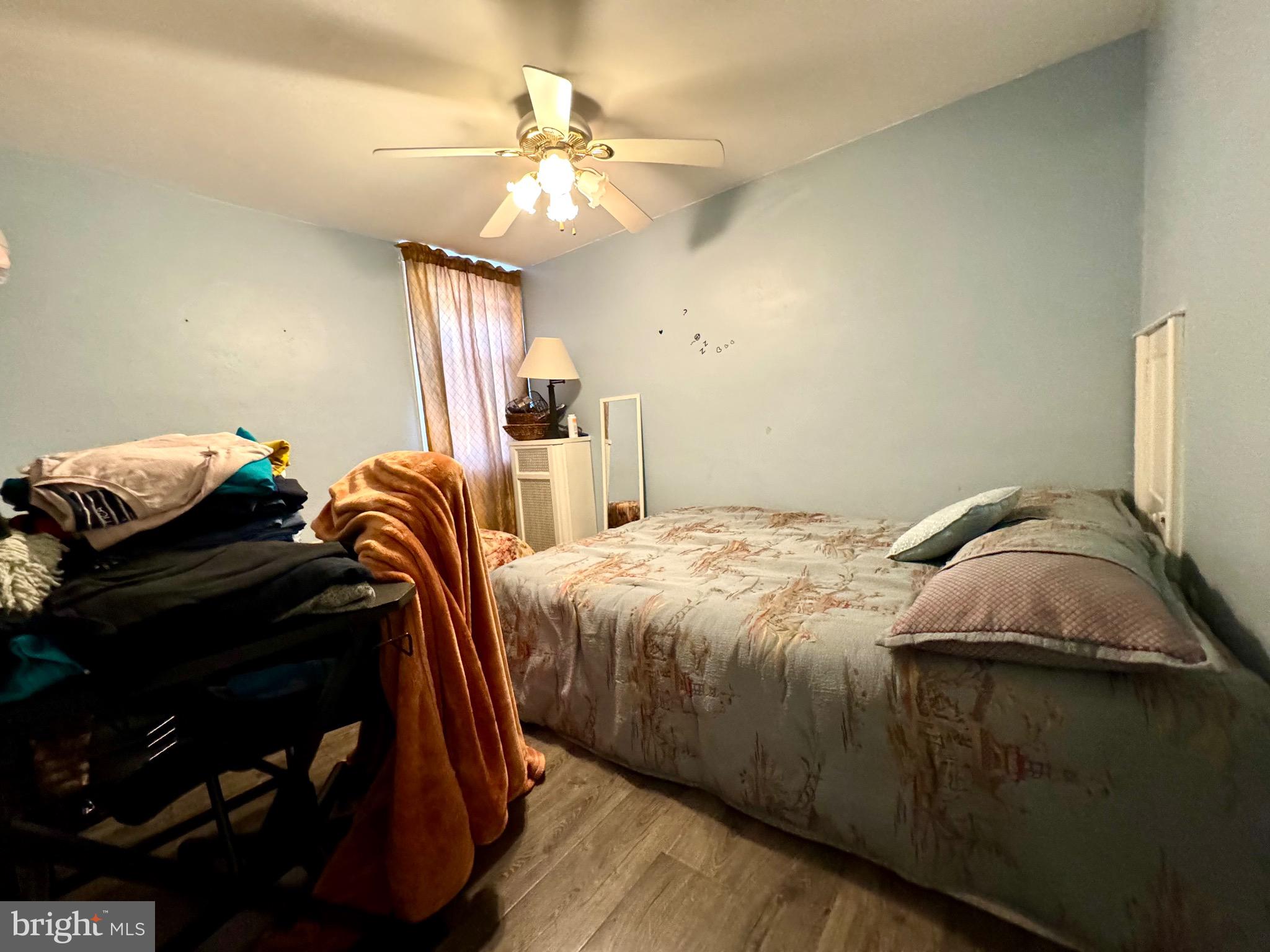 3335 Brighton Street Philadelphia, PA 19149 - Photo 14 of 24 a bedroom with a bed and ceiling fan