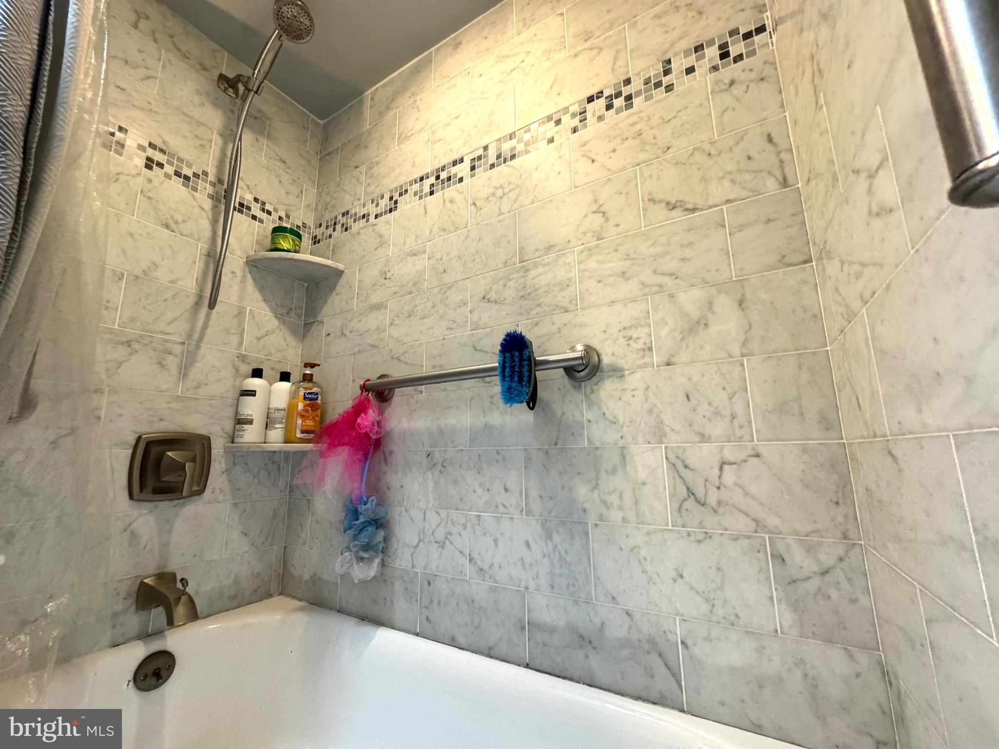 3335 Brighton Street Philadelphia, PA 19149 - Photo 18 of 24 a bathroom with a shower