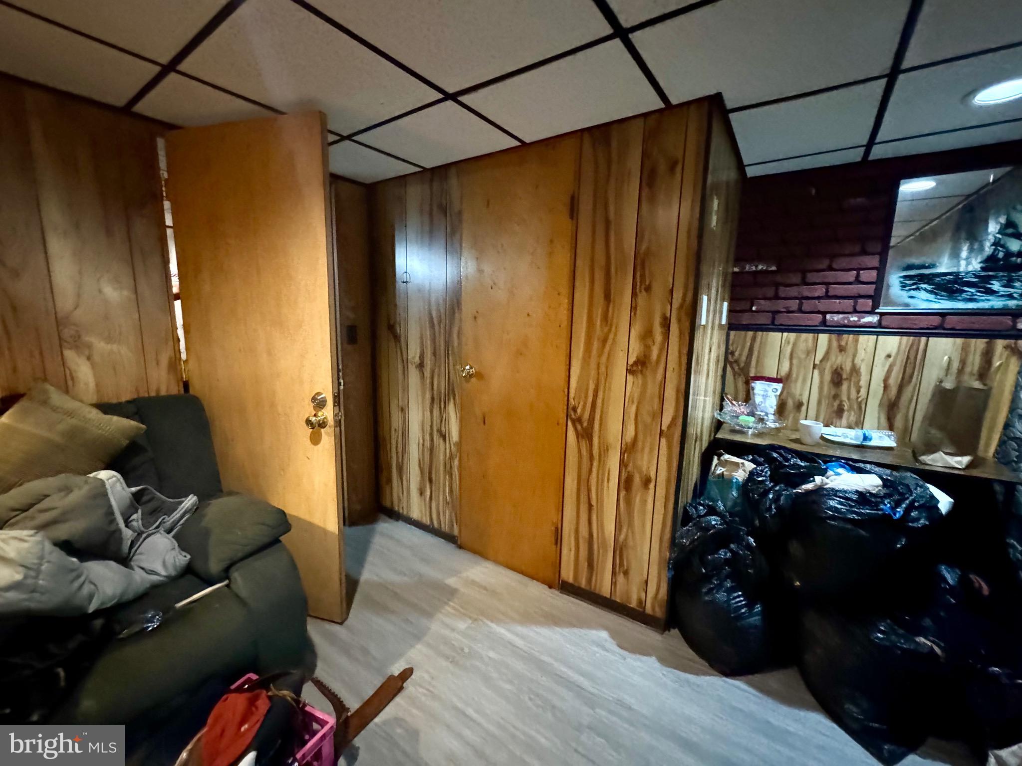 3335 Brighton Street Philadelphia, PA 19149 - Photo 20 of 24 a living room with furniture and a floor to ceiling window