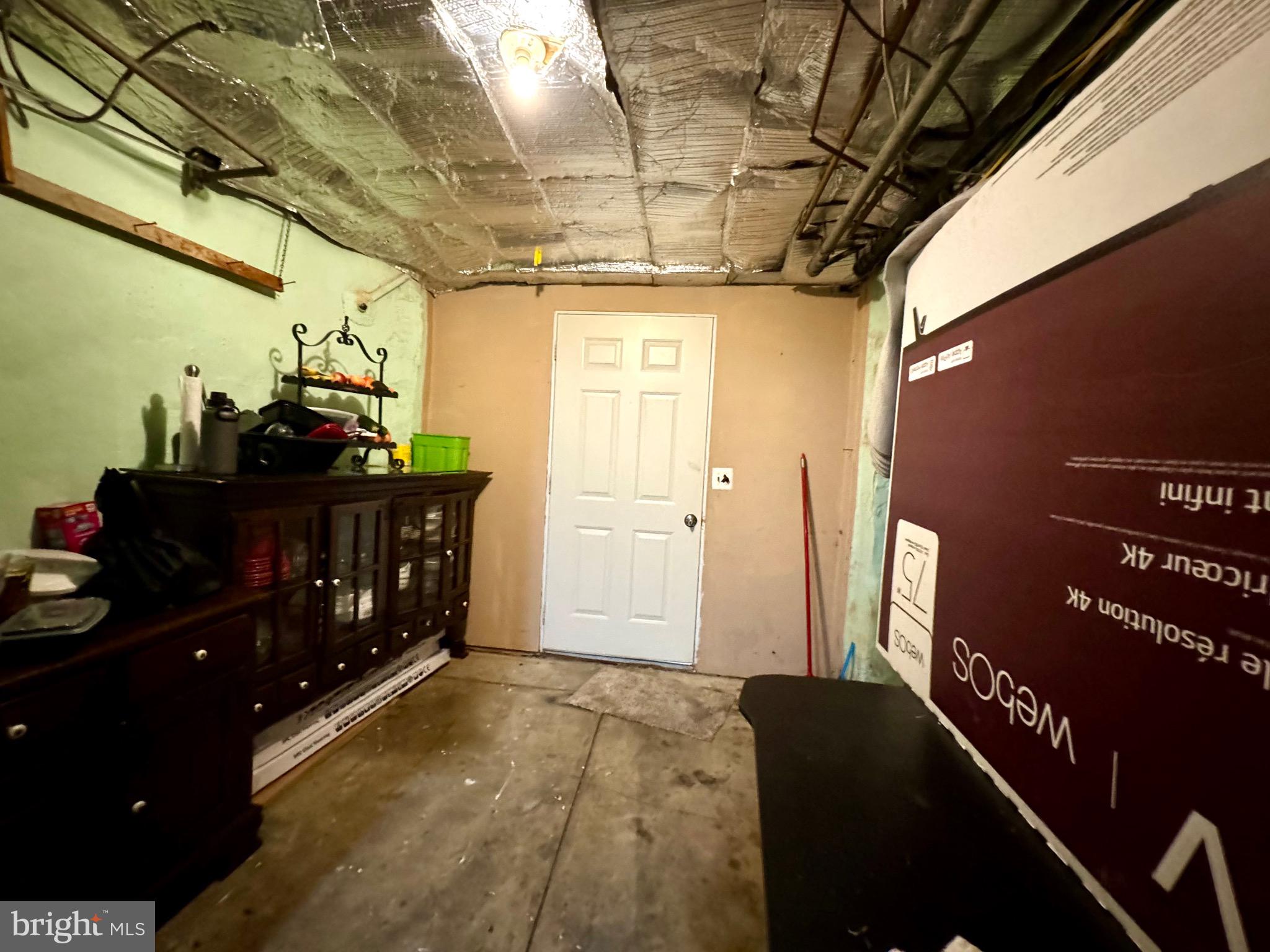 3335 Brighton Street Philadelphia, PA 19149 - Photo 24 of 24 a bedroom with a bed and a dresser