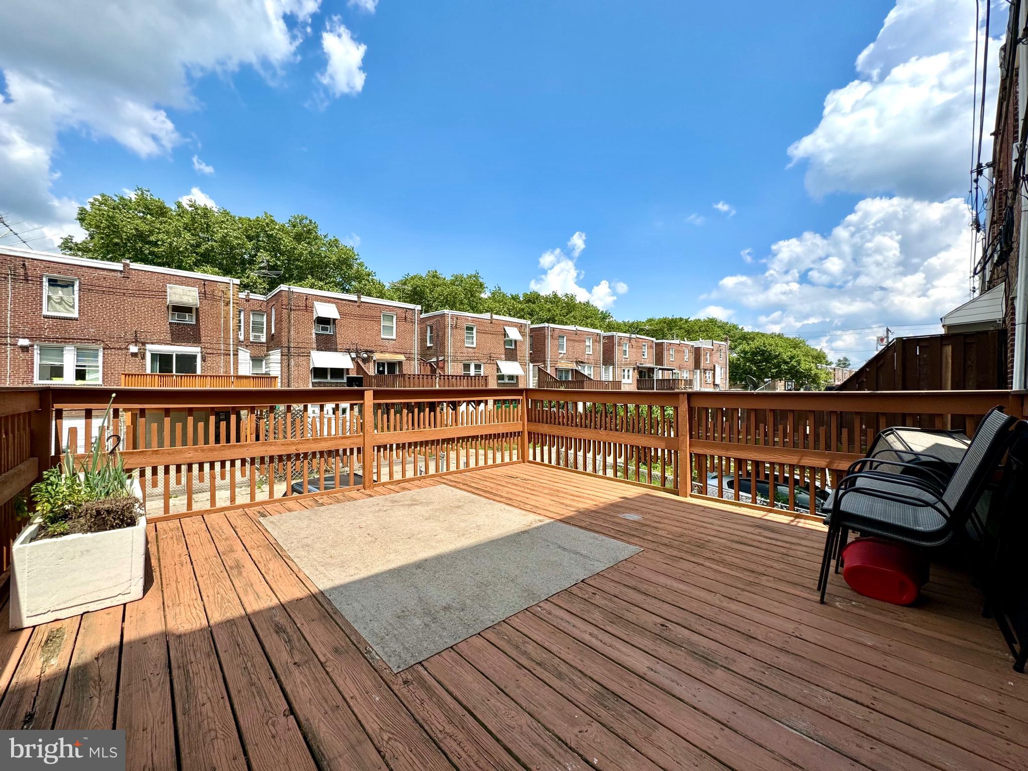 3335 Brighton Street Philadelphia, PA 19149 - Photo 8 of 24 a view of a balcony with wooden floor
