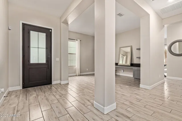 a view of a bathroom from the hallway