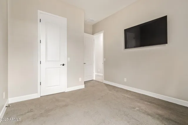 a view of a livingroom with a flat screen tv