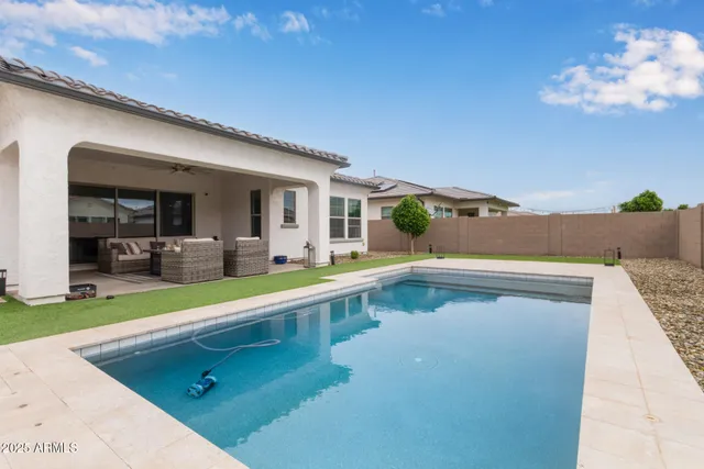 a view of a kitchen with a large window
