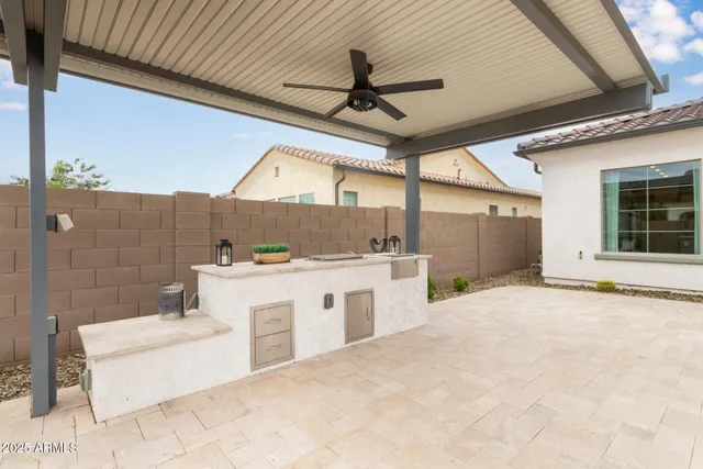 a view of a bathroom with a sink and mirror