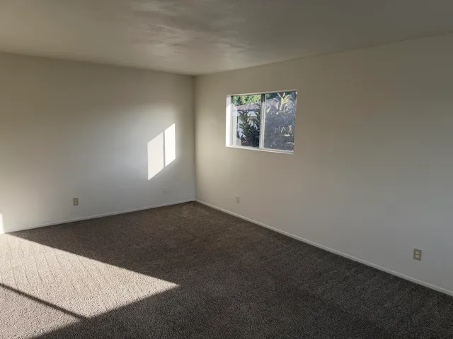 an empty room with a window