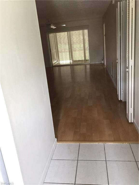 5651 Rattlesnake Hammock Road, Unit C108 Naples, FL 34113 - Photo 3 of 14