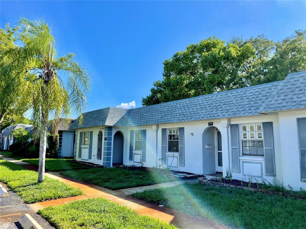 4227 Sheldon Place, Unit 4227 New Port Richey, FL 34652 - Photo 1 of 1 The Gardens of Beacon Sq II with assigned parking spot.