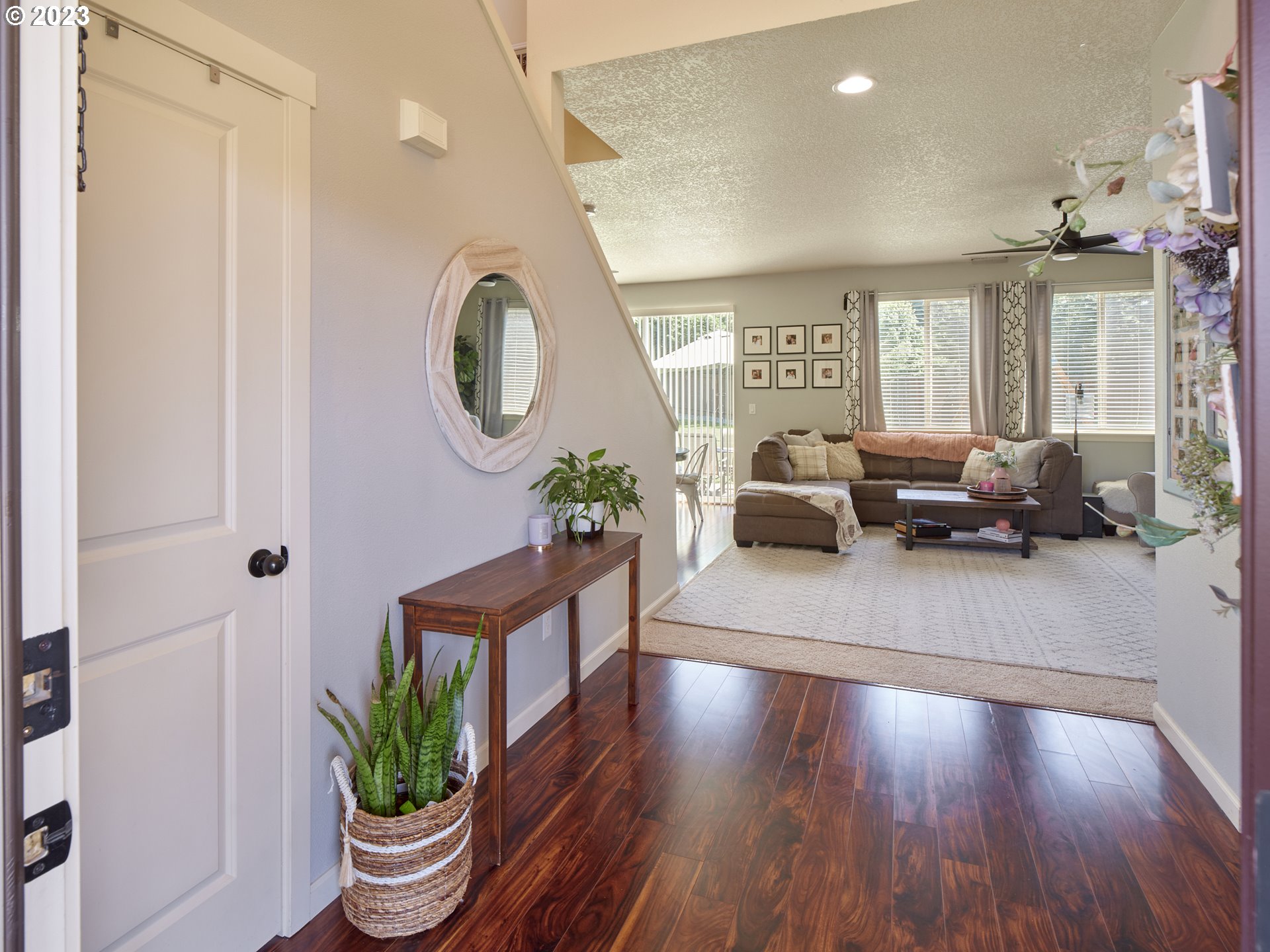 3551 North 1st Street Ridgefield, WA 98642 - Photo 3 of 38 a living room with furniture and a potted plant