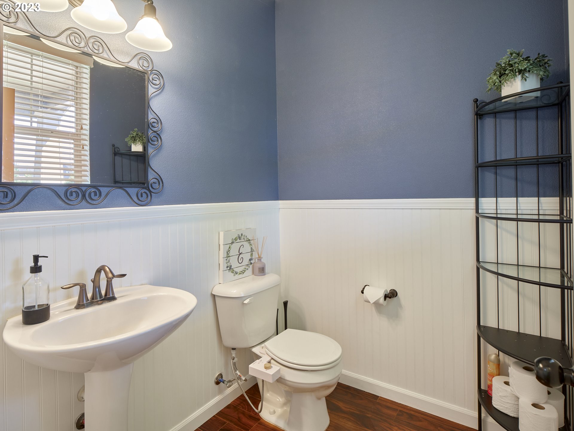 3551 North 1st Street Ridgefield, WA 98642 - Photo 4 of 38 a bathroom with a sink a toilet and mirror