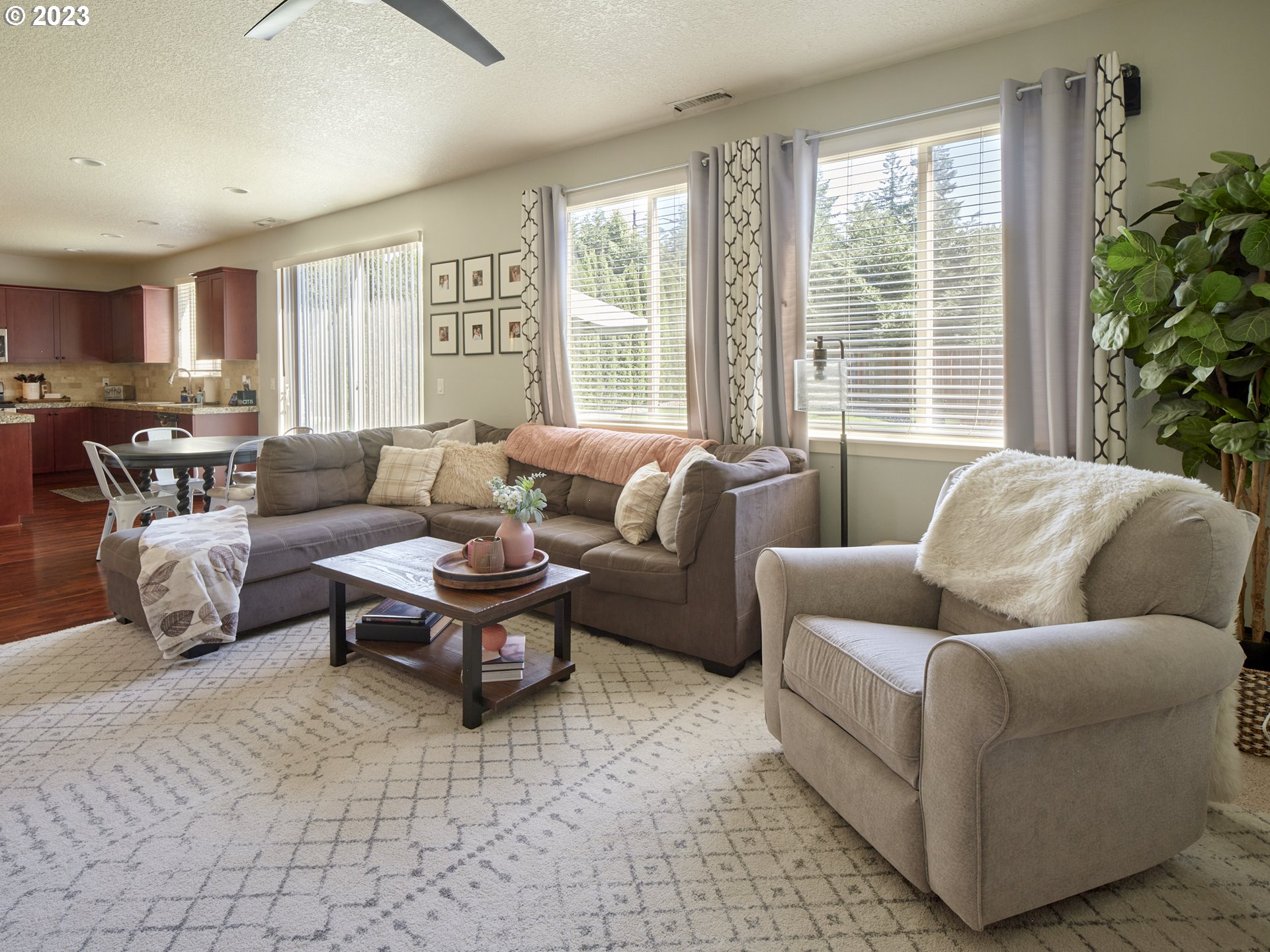 3551 North 1st Street Ridgefield, WA 98642 - Photo 8 of 38 a living room with furniture and a large window