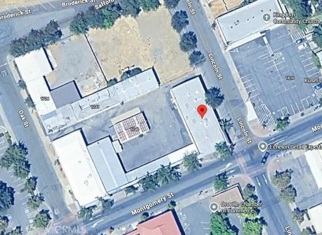 an aerial view of a fireplace with wooden floor