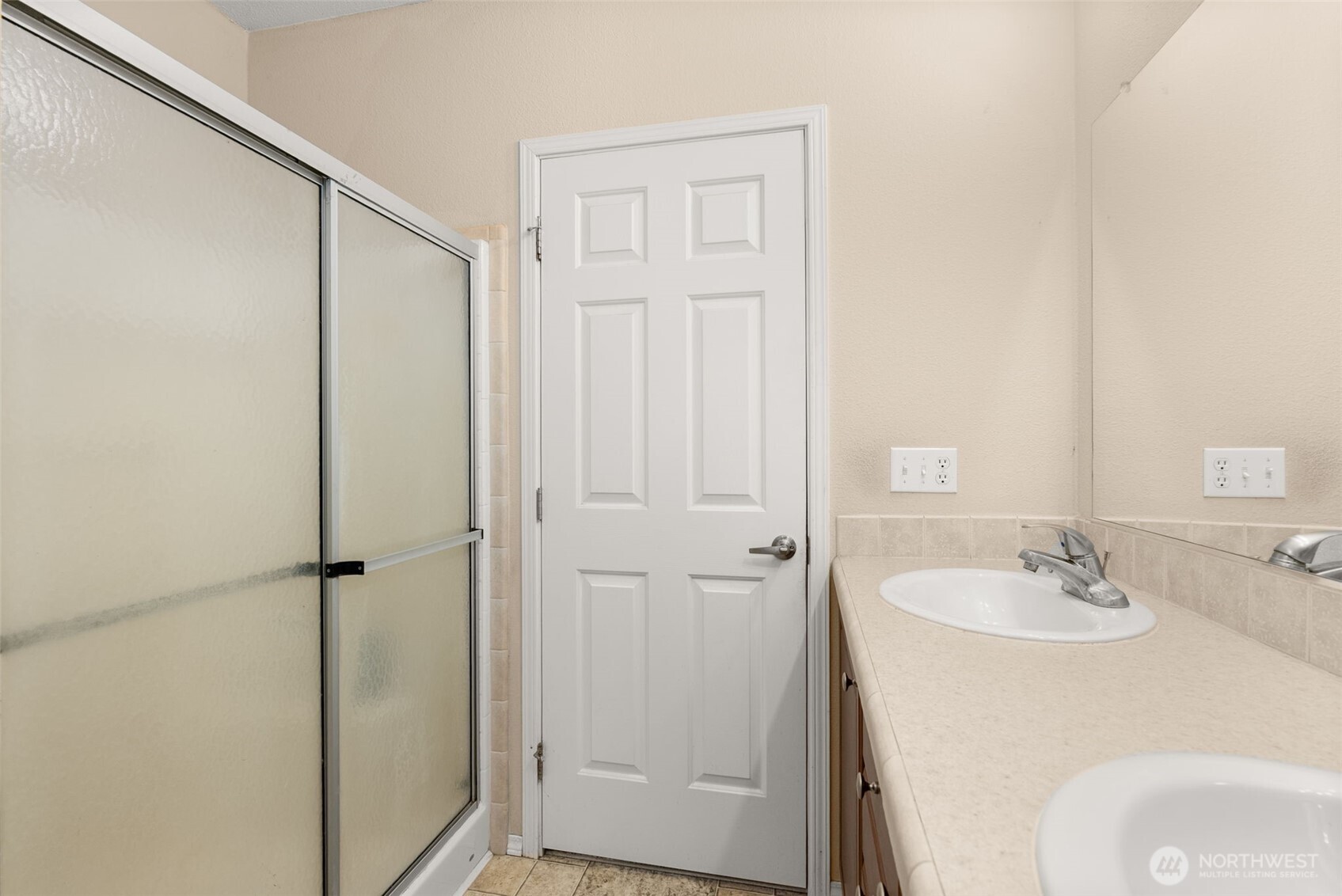 22010 Summers Road Centralia, WA 98531 - Photo 19 of 33 a bathroom with a sink and shower