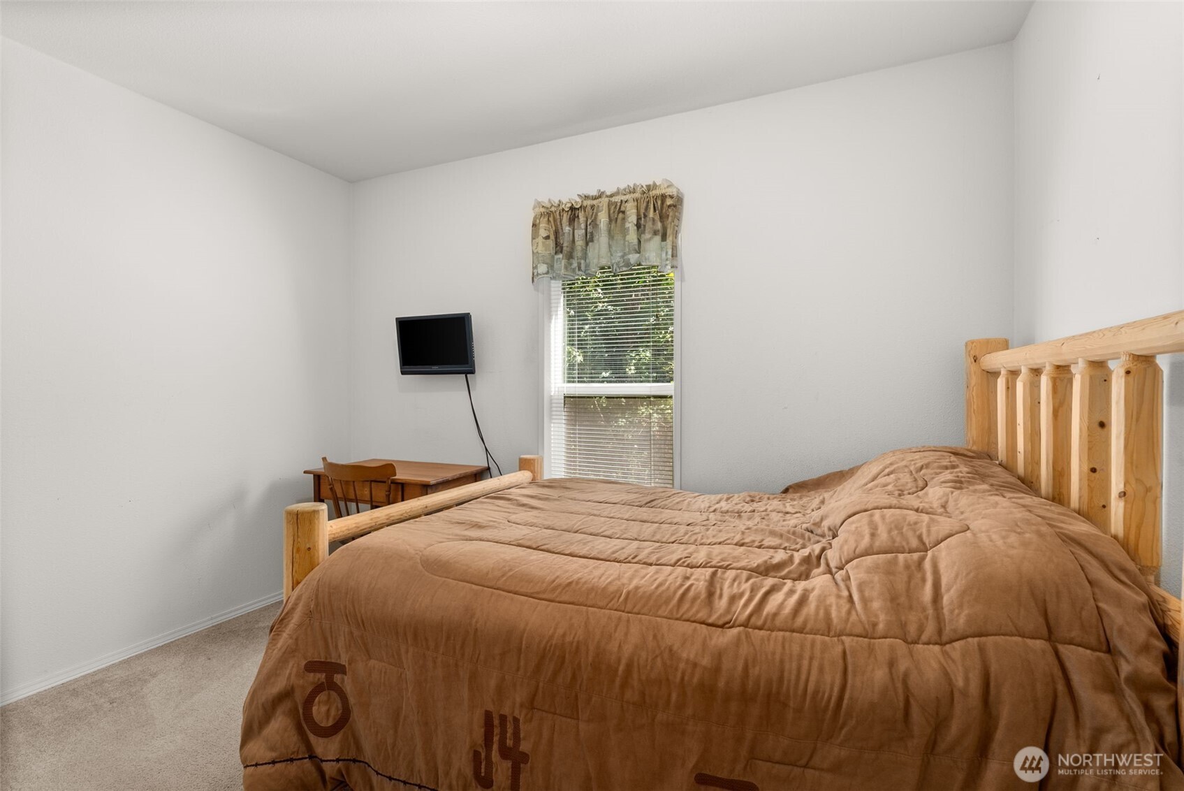 22010 Summers Road Centralia, WA 98531 - Photo 20 of 33 a bedroom with a bed and tv