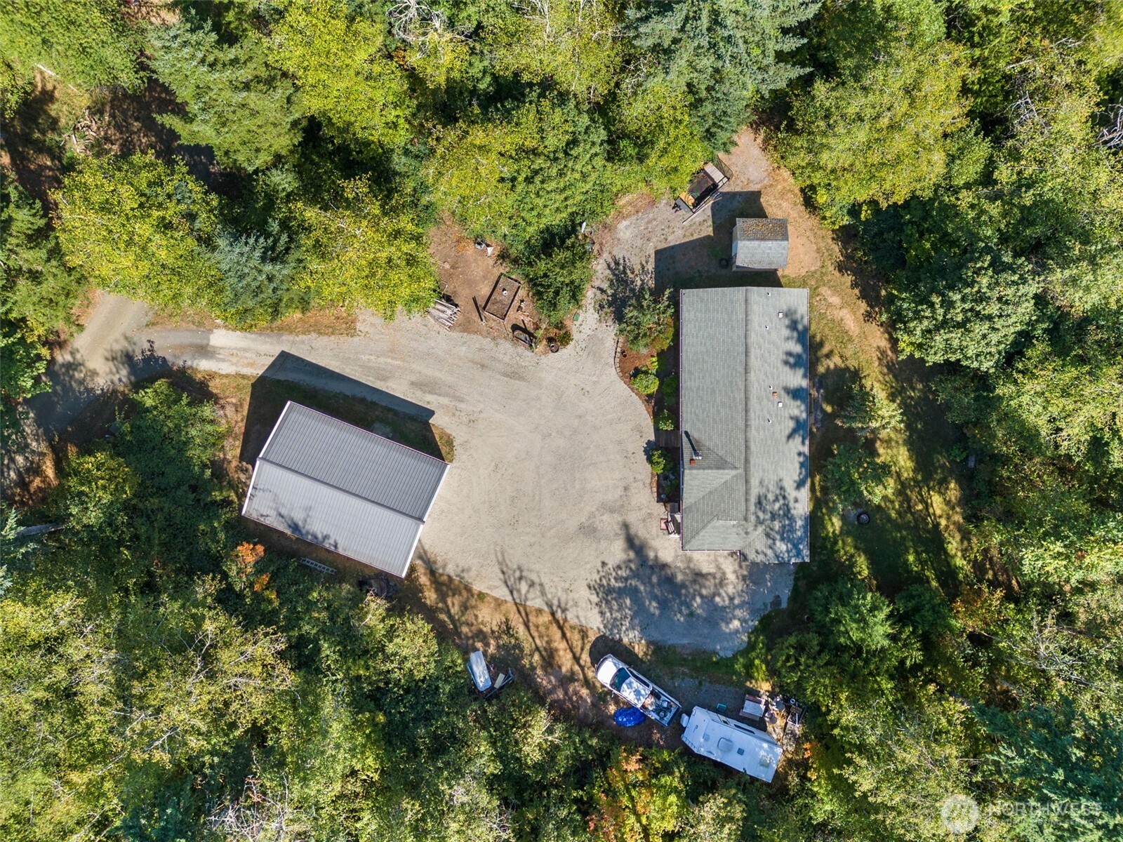 22010 Summers Road Centralia, WA 98531 - Photo 32 of 33 an aerial view of a house with a yard and large trees