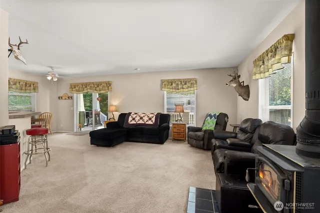 a living room with furniture and a window