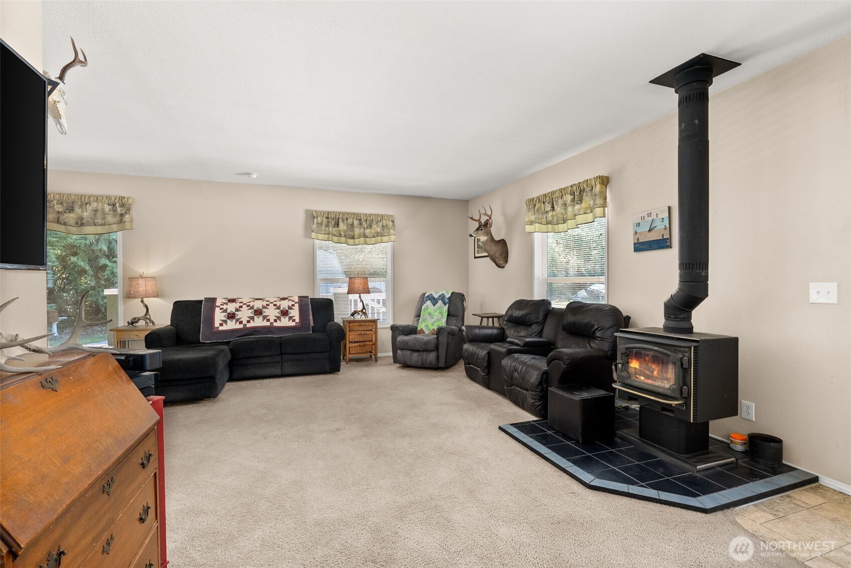 22010 Summers Road Centralia, WA 98531 - Photo 6 of 33 a living room with furniture windows and a fireplace