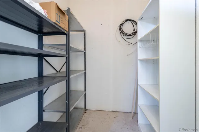 a view of staircase with wooden door