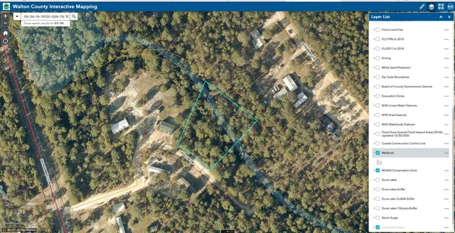 a view of a window with tree in the background