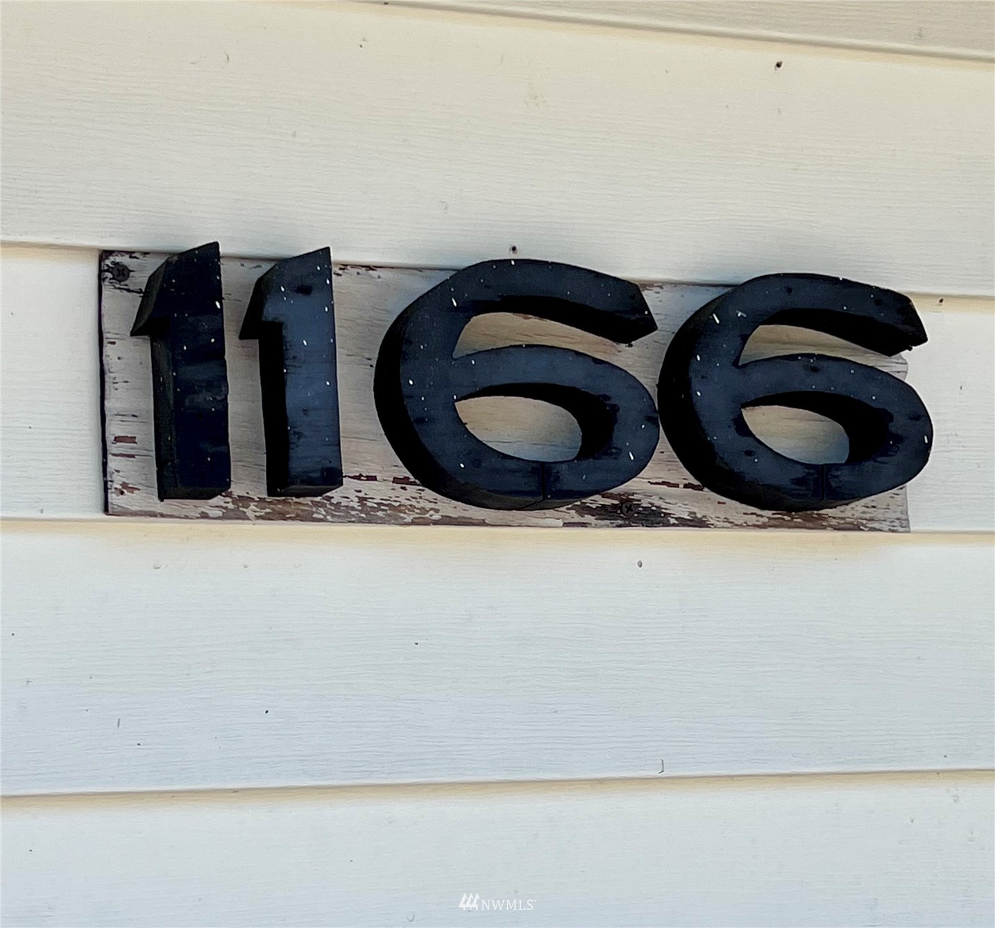 1166 Brookdale Road East Tacoma, WA 98445 - Photo 20 of 20 a bathroom with a granite countertop sink and a mirror