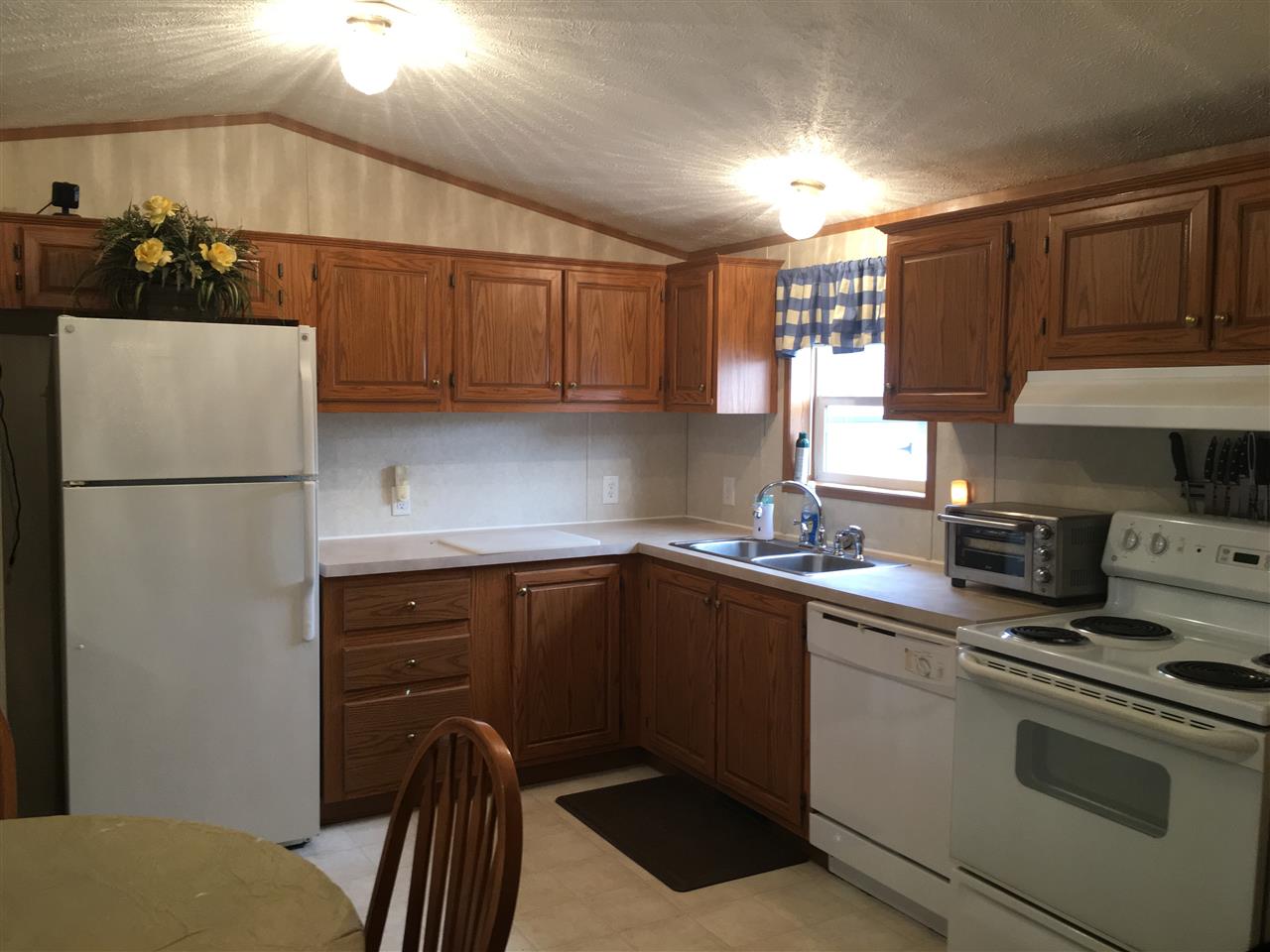 30 Kendall Pond Road, Unit 95 Derry, NH 03038 - Photo 6 of 18