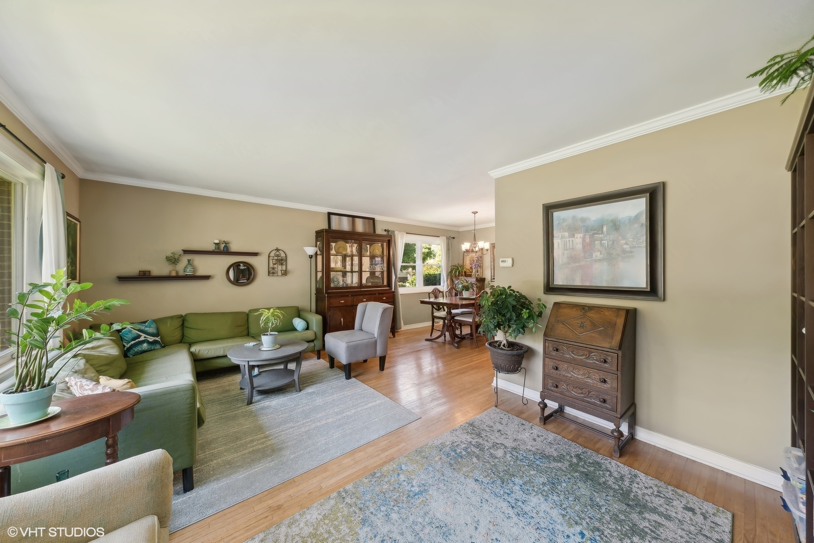 750 Leaf Court Bartlett, IL 60103 - Photo 3 of 17 a living room with furniture and a potted plant