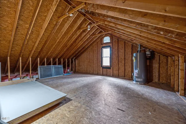 a balcony with wooden floor and trees